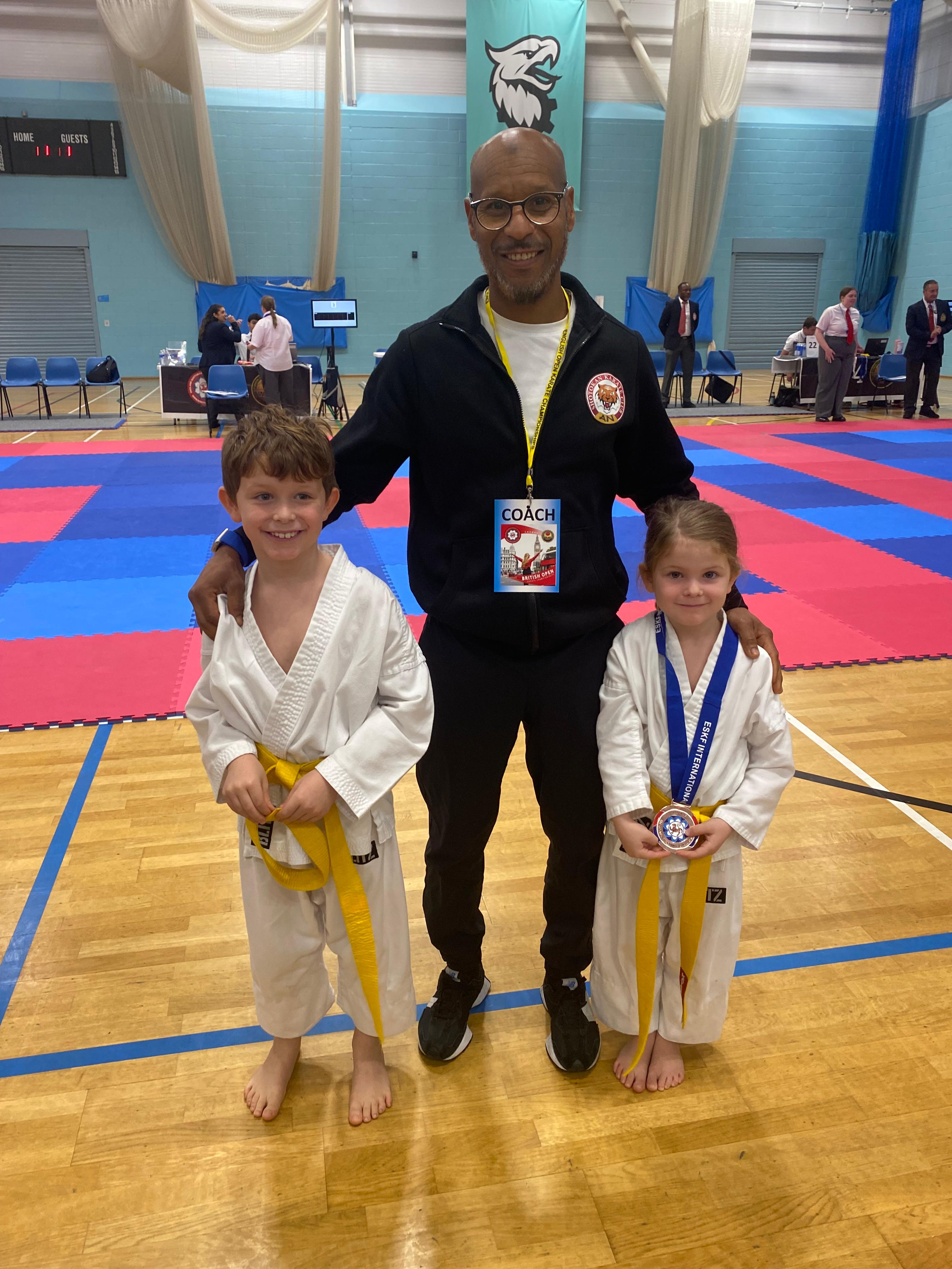 AN Shotokan Karate grading day ceremony with students receiving belts