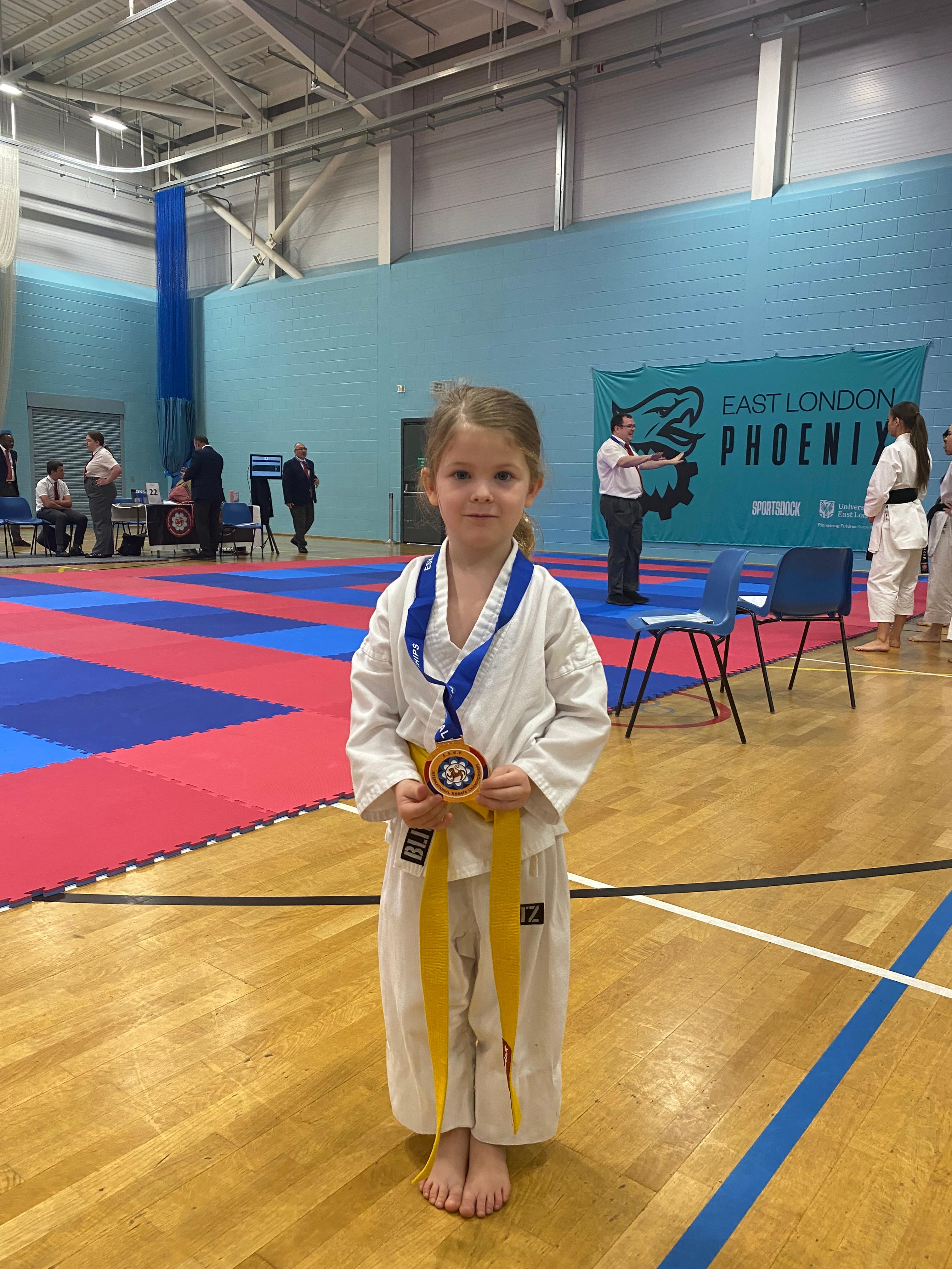 AN Shotokan Karate grading day ceremony with students receiving belts